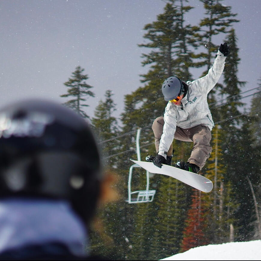 Untitled Snowboarder mid-jump on a Flagstaff-area run