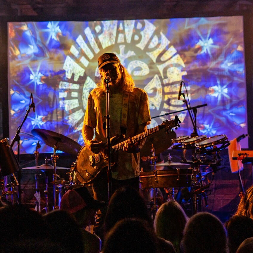 Untitled Hip Abduction band on a live stage